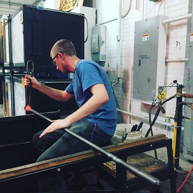 James Eddlestone in the hot shop blowing glass