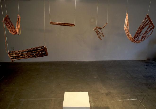 Suspended wax forms, stringy 