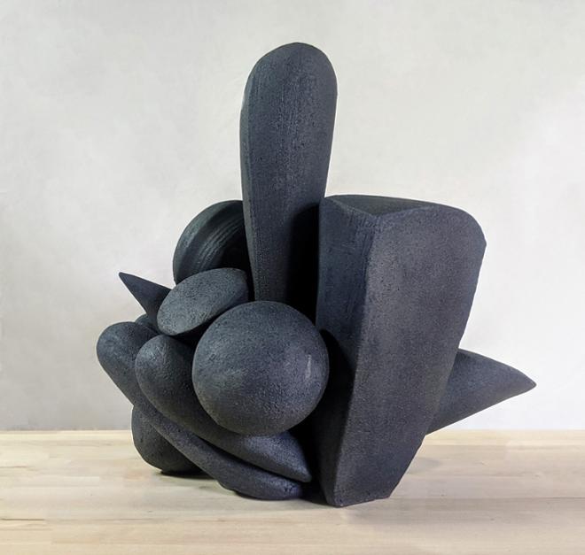 Spiky, black abstract ceramic form.