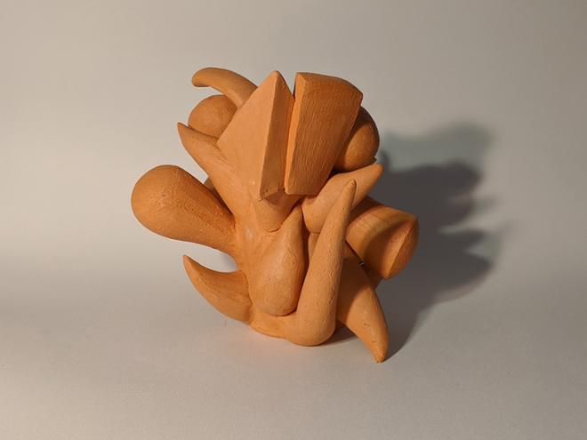 Abstract, blobbed ceramic form, orange clay.