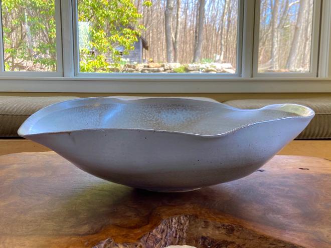 A white oblong ceramic bowl.