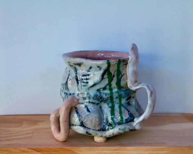 Ceramic mug with long handle,