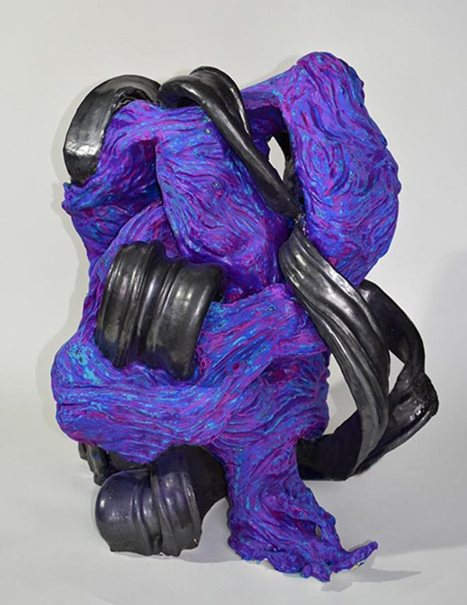 A purple and black abstract vessel consisting of interlocking, flowing forms. 