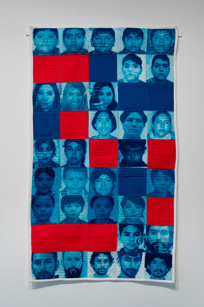 quilt-like art piece featuring various faces by Aida Lizalde